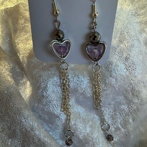Beautiful Heart with sparkling glass crystals hanging gently down the neck.